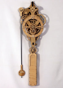 Full front facing view of clock. Displays head, gears, pendulum, and overall design.