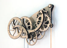 Load image into Gallery viewer, 1/4 view of clock head hung on a white wall.
