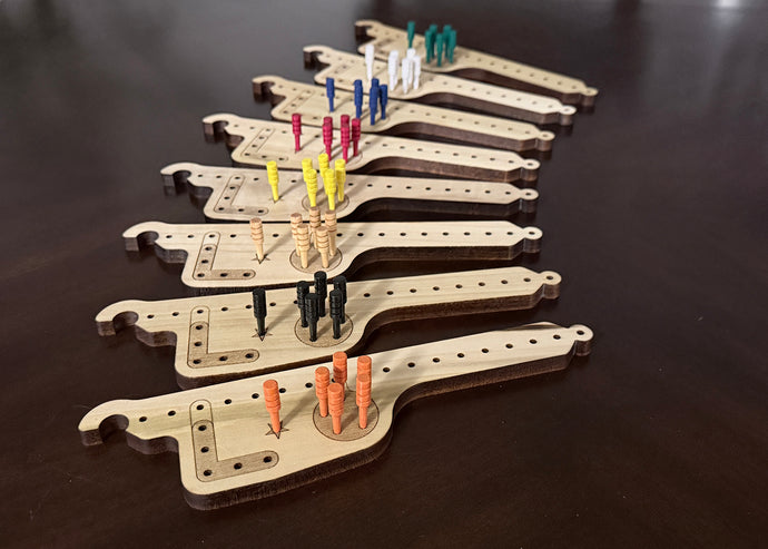 Pegs and Jokers Board Game