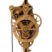 将图片加载到图库查看器，Front facing view of &#39;David&#39; mechanical clock. Cropped to show head of clock &amp; gears. It is displayed on a white background.

