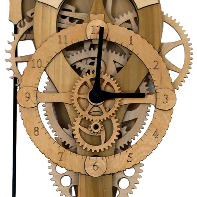 Close up view of head of 'Vera' mechanical clock. Shows gears and nose on a blank background.